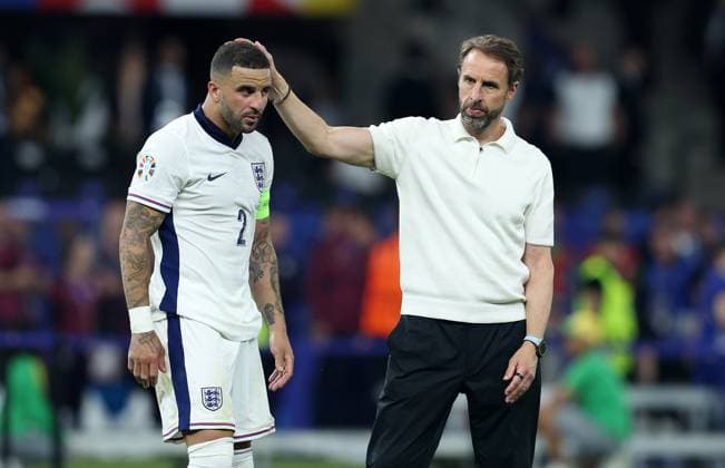 Berlin, Germany, 14th July 2024. Kyle Walker of England and Gareth Southgate manager of England look dejected after the UEFA European Championships final match at Olympiastadion, Berlin. Picture: Paul Terry Sportimage EDITORIAL USE ONLY. No use with unauthorised audio, video, data, fixture lists, club league logos or live services. Online in-match use limited to 120 images, no video emulation. No use in betting, games or single club league player publications. SPI-3227-0320