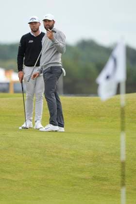 17th July 2024; Royal Troon Golf Club, Troon, South Ayrshire, Scotland; The Open Championship Practice Day 3; Scottie Scheffler and Sam Burns study their putts on the 15th green  ActionPlus12669044 StevenxFlynn