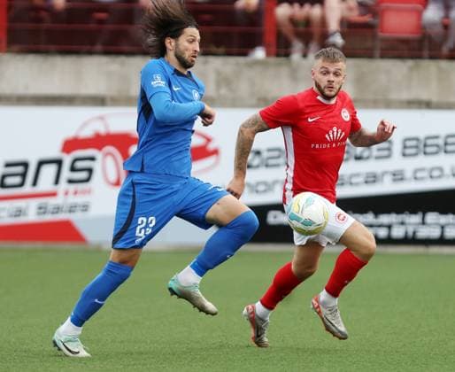 UEFA Champions League First Qualifying Round Second Leg, Inver Park, Larne 17 7 2024 Larne vs RFS Larne™s Andrew Ryan with RFS™ Herdi Prenga Andrew Ryan with Herdi Prenga 17 7 2024  Copyright: x INPHO JonathanxPorterx pe_00959213