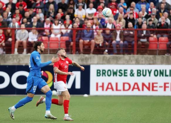 UEFA Champions League First Qualifying Round Second Leg, Inver Park, Larne 17 7 2024 Larne vs RFS Larne™s Andrew Ryan with RFS™ Herdi Prenga Andrew Ryan with Herdi Prenga 17 7 2024  Copyright: x INPHO JonathanxPorterx pe_00959217