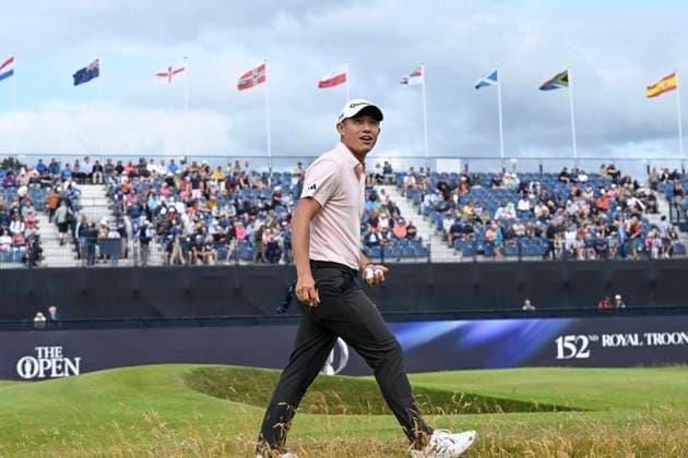 17th July 2024; Royal Troon Golf Club, Troon, South Ayrshire, Scotland; The Open Championship Practice Day 3; Collin Morikawa walks down the 18th fairway to distribute golf balls to young fans  ActionPlus12669273 StevenxFlynn