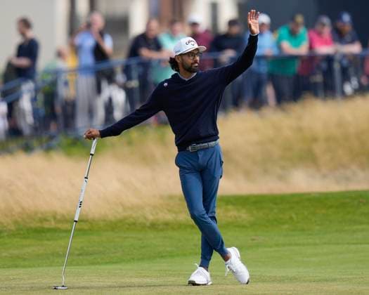 17th July 2024; Royal Troon Golf Club, Troon, South Ayrshire, Scotland; The Open Championship Practice Day 3; Akshay Bhatia waves to fans on the 18th fairway  ActionPlus12669253 StevenxFlynn