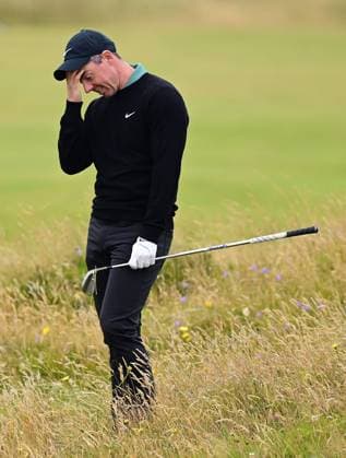 Rory McIlroy looks dejected on the 15th fairway after hitting a shot from the rough into a green side bunker The British Open Championship, Day One, Golf, Royal Troon, Troon, UK - 18 July 2024  Copyright: xGreigxCowie Shutterstockx 14587994i