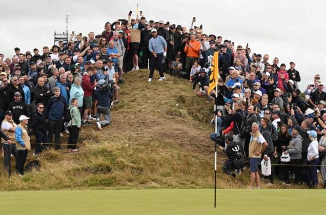 Xander Schauffele chips from the top of a steep embankment on the 12th Green The British Open Championship, Day Two, Golf, Royal Troon, Troon, UK - 19 July 2024  Copyright: xGreigxCowie Shutterstockx 14587995v