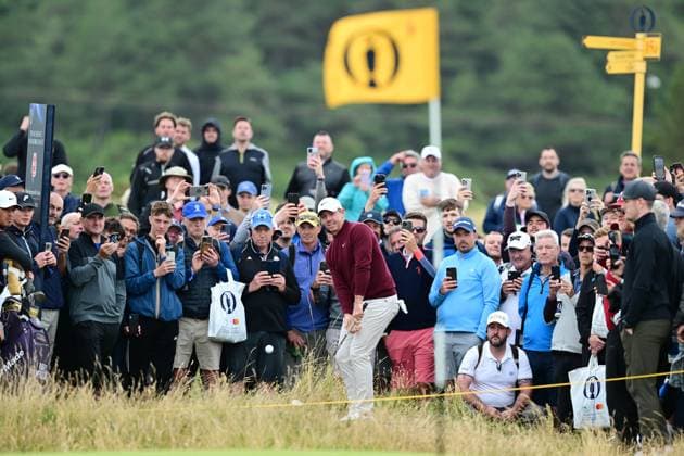 After Pulling his ball into the crowd on the 4th fairway Rory McIlroy thins his escape through the green and into a bunker and then after getting out of the bunker misses his putt and ends up with a Double Bogey The British Open Championship, Day Two, Golf, Royal Troon, Troon, UK - 19 July 2024  Copyright: xGreigxCowie Shutterstockx 14587995ay