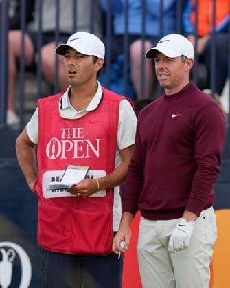 19th July 2024; Royal Troon Golf Club, Troon, South Ayrshire, Scotland; The Open Championship Round 2; Rory McIlroy and Caddy Harry Diamond consult the yardage book  ActionPlus12669975 StevenxFlynn
