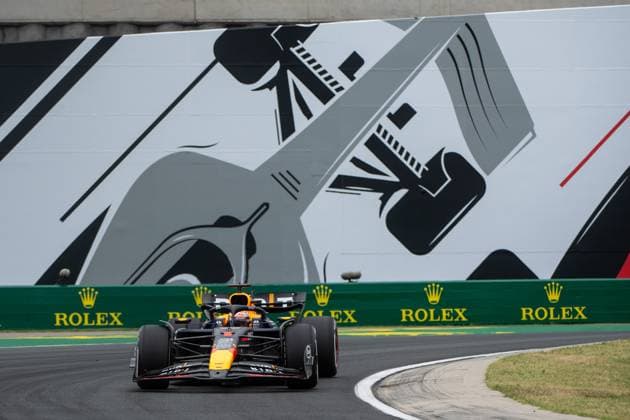 Max Verstappen Oracle Red Bull Racing, Netherlands, 01 in RedBull RB20, in front of the painting of a silver Formula 1 car and Rolex branding, HUN, Formula 1 World Championship, Hungarian Grand Prix, Hungaroring, Free Practice, 20 07 2024 HUN, Formula 1 World Championship, Hungarian Grand Prix, Hungaroring, Free Practice, 20 07 2024 Mogyorod Copyright: xEibner-Pressefoto Memmlerx EP_MMR