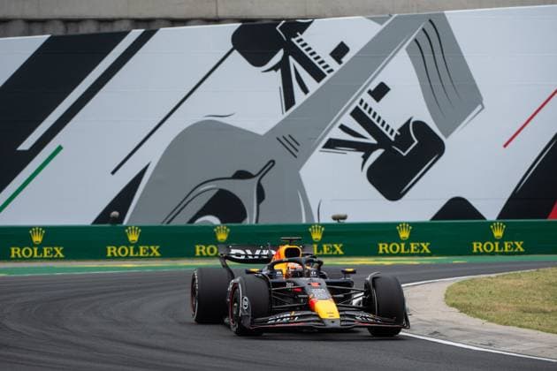 Max Verstappen Oracle Red Bull Racing, Netherlands, 01 in RedBull RB20, in front of the painting of a silver Formula 1 car and Rolex branding, HUN, Formula 1 World Championship, Hungarian Grand Prix, Hungaroring, Free Practice, 20 07 2024 HUN, Formula 1 World Championship, Hungarian Grand Prix, Hungaroring, Free Practice, 20 07 2024 Mogyorod Copyright: xEibner-Pressefoto Memmlerx EP_MMR