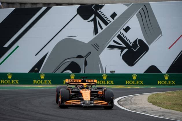 Oscar Piastri McLaren Formula 1 Team, Australia, 81 in McLaren MCL38 in front of the painting of a silver Formula 1 car and Rolex branding, HUN, Formula 1 World Championship, Hungarian Grand Prix, Hungaroring, Free Practice, 20 07 2024 HUN, Formula 1 World Championship, Hungarian Grand Prix, Hungaroring, Free Practice, 20 07 2024 Mogyorod Copyright: xEibner-Pressefoto Memmlerx EP_MMR