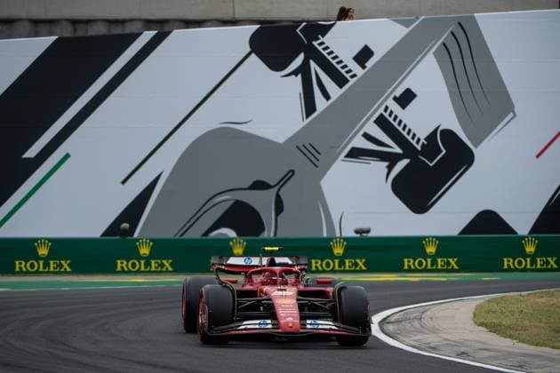 Carlos Sainz Scuderia Ferrari HP, Spain, 55 in Ferrari SF 24 in front of a painting of a silver Formula 1 car and Rolex branding, HUN, Formula 1 World Championship, Hungarian Grand Prix, Hungaroring, Free Practice, 20 07 2024 HUN, Formula 1 World Championship, Hungarian Grand Prix, Hungaroring, Free Practice, 20 07 2024 Mogyorod Copyright: xEibner-Pressefoto Memmlerx EP_MMR