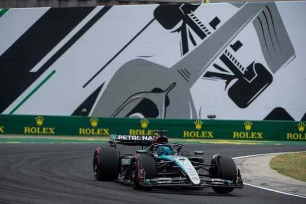 George Russell Mercedes AMG Petronas Formula One Team, Great Britain, 63 in the Mercedes AMG F1 W15 E Performance in front of a painting of a silver Formula 1 car and Rolex branding, HUN, Formula 1 World Championship, Hungarian Grand Prix, Hungaroring, Free Practice, 20 07 2024 HUN, Formula 1 World Championship, Hungarian Grand Prix, Hungaroring, Free Practice, 20 07 2024 Mogyorod Copyright: xEibner-Pressefoto Memmlerx EP_MMR
