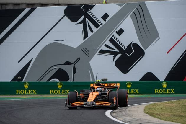 Lando Norris McLaren Formula 1 Team, Great Britain, 04 in McLaren MCL38 in front of a painting of a silver Formula 1 car and Rolex branding, HUN, Formula 1 World Championship, Hungarian Grand Prix, Hungaroring, Free Practice, 20 07 2024 HUN, Formula 1 World Championship, Hungarian Grand Prix, Hungaroring, Free Practice, 20 07 2024 Mogyorod Copyright: xEibner-Pressefoto Memmlerx EP_MMR