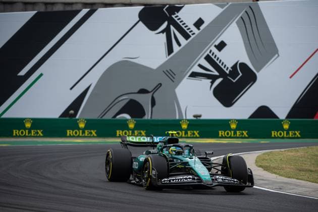 Fernando Alonso Aston Martin Aramco Formula One Team, Spain, 14 in Aston Martin AMR24 in front of the painting of a silver Formula 1 car and Rolex branding, HUN, Formula 1 World Championship, Hungarian Grand Prix, Hungaroring, Free Practice, 20 07 2024 HUN, Formula 1 World Championship, Hungarian Grand Prix, Hungaroring, Free Practice, 20 07 2024 Mogyorod Copyright: xEibner-Pressefoto Memmlerx EP_MMR