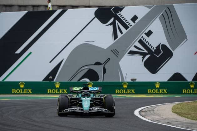 Lance Stroll Aston Martin Aramco Formula One Team, Canada, 18 in Aston Martin AMR24 in front of the painting of a silver Formula 1 car and Rolex branding, HUN, Formula 1 World Championship, Hungarian Grand Prix, Hungaroring, Free Practice, 20 07 2024 HUN, Formula 1 World Championship, Hungarian Grand Prix, Hungaroring, Free Practice, 20 07 2024 Mogyorod Copyright: xEibner-Pressefoto Memmlerx EP_MMR