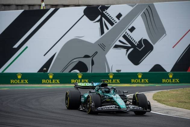 Lance Stroll Aston Martin Aramco Formula One Team, Canada, 18 in Aston Martin AMR24 in front of the painting of a silver Formula 1 car and Rolex branding, HUN, Formula 1 World Championship, Hungarian Grand Prix, Hungaroring, Free Practice, 20 07 2024 HUN, Formula 1 World Championship, Hungarian Grand Prix, Hungaroring, Free Practice, 20 07 2024 Mogyorod Copyright: xEibner-Pressefoto Memmlerx EP_MMR