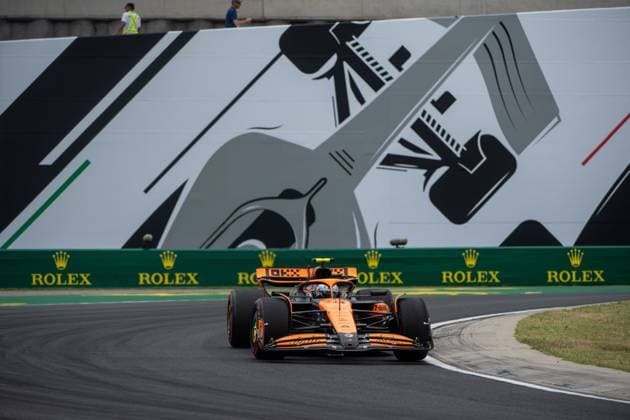 Lando Norris McLaren Formula 1 Team, Great Britain, 04 in McLaren MCL38 in front of a painting of a silver Formula 1 car and Rolex branding, HUN, Formula 1 World Championship, Hungarian Grand Prix, Hungaroring, Free Practice, 20 07 2024 HUN, Formula 1 World Championship, Hungarian Grand Prix, Hungaroring, Free Practice, 20 07 2024 Mogyorod Copyright: xEibner-Pressefoto Memmlerx EP_MMR