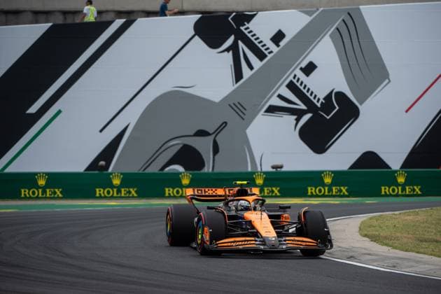 Oscar Piastri McLaren Formula 1 Team, Australia, 81 in McLaren MCL38 in front of the painting of a silver Formula 1 car and Rolex branding, HUN, Formula 1 World Championship, Hungarian Grand Prix, Hungaroring, Free Practice, 20 07 2024 HUN, Formula 1 World Championship, Hungarian Grand Prix, Hungaroring, Free Practice, 20 07 2024 Mogyorod Copyright: xEibner-Pressefoto Memmlerx EP_MMR
