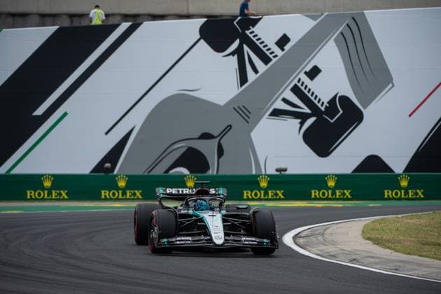 George Russell Mercedes AMG Petronas Formula One Team, Great Britain, 63 in the Mercedes AMG F1 W15 E Performance in front of a painting of a silver Formula 1 car and Rolex branding, HUN, Formula 1 World Championship, Hungarian Grand Prix, Hungaroring, Free Practice, 20 07 2024 HUN, Formula 1 World Championship, Hungarian Grand Prix, Hungaroring, Free Practice, 20 07 2024 Mogyorod Copyright: xEibner-Pressefoto Memmlerx EP_MMR