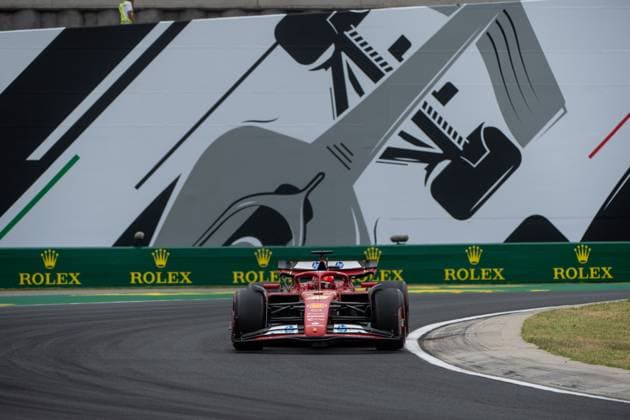 Charles Leclerc Scuderia Ferrari HP, Monaco, 16 in Ferrari SF 24 in front of a painting of a silver Formula 1 car and Rolex branding, HUN, Formula 1 World Championship, Hungarian Grand Prix, Hungaroring, Free Practice, 20 07 2024 HUN, Formula 1 World Championship, Hungarian Grand Prix, Hungaroring, Free Practice, 20 07 2024 Mogyorod Copyright: xEibner-Pressefoto Memmlerx EP_MMR