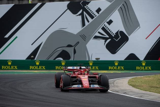Charles Leclerc Scuderia Ferrari HP, Monaco, 16 in Ferrari SF 24 in front of a painting of a silver Formula 1 car and Rolex branding, HUN, Formula 1 World Championship, Hungarian Grand Prix, Hungaroring, Free Practice, 20 07 2024 HUN, Formula 1 World Championship, Hungarian Grand Prix, Hungaroring, Free Practice, 20 07 2024 Mogyorod Copyright: xEibner-Pressefoto Memmlerx EP_MMR