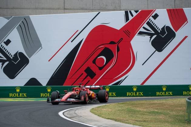 Charles Leclerc Scuderia Ferrari HP, Monaco, 16 in Ferrari SF 24 in front of the painting of a red Formula 1 car and Rolex branding, HUN, Formula 1 World Championship, Hungarian Grand Prix, Hungaroring, Free Practice, 20 07 2024 HUN, Formula 1 World Championship, Hungarian Grand Prix, Hungaroring, Free Practice, 20 07 2024 Mogyorod Copyright: xEibner-Pressefoto Memmlerx EP_MMR