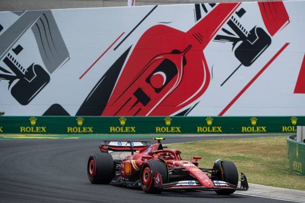 Carlos Sainz Scuderia Ferrari HP, Spain, 55 in Ferrari SF 24 in front of a painting of a red Formula 1 car and Rolex branding, HUN, Formula 1 World Championship, Hungarian Grand Prix, Hungaroring, Free Practice, 20 07 2024 HUN, Formula 1 World Championship, Hungarian Grand Prix, Hungaroring, Free Practice, 20 07 2024 Mogyorod Copyright: xEibner-Pressefoto Memmlerx EP_MMR