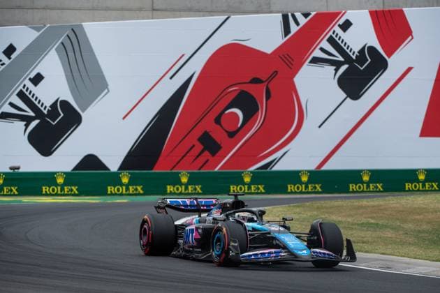 Esteban Ocon BWT Alpine F1 Team, France, 31 in Alpine A524 in front of the painting of a red Formula 1 car and Rolex branding, HUN, Formula 1 World Championship, Hungarian Grand Prix, Hungaroring, Free Practice, 20 07 2024 HUN, Formula 1 World Championship, Hungarian Grand Prix, Hungaroring, Free Practice, 20 07 2024 Mogyorod Copyright: xEibner-Pressefoto Memmlerx EP_MMR