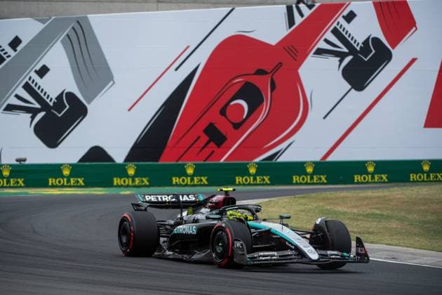 Lewis Hamilton Mercedes AMG Petronas Formula One Team, Great Britain, 44 in the Mercedes AMG F1 W15 E Performance in front of the painting of a red Formula 1 car and Rolex branding, HUN, Formula 1 World Championship, Hungarian Grand Prix, Hungaroring, Free Practice, 20 07 2024 HUN, Formula 1 World Championship, Hungarian Grand Prix, Hungaroring, Free Practice, 20 07 2024 Mogyorod Copyright: xEibner-Pressefoto Memmlerx EP_MMR