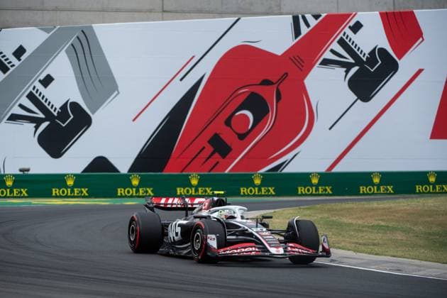 Nico Huelkenberg MoneyGram Haas F1 Team, Germany, 27 in Haas VF 24 in front of the painting of a red Formula 1 car and Rolex branding, HUN, Formula 1 World Championship, Hungarian Grand Prix, Hungaroring, Free Practice, 20 07 2024 HUN, Formula 1 World Championship, Hungarian Grand Prix, Hungaroring, Free Practice, 20 07 2024 Mogyorod Copyright: xEibner-Pressefoto Memmlerx EP_MMR