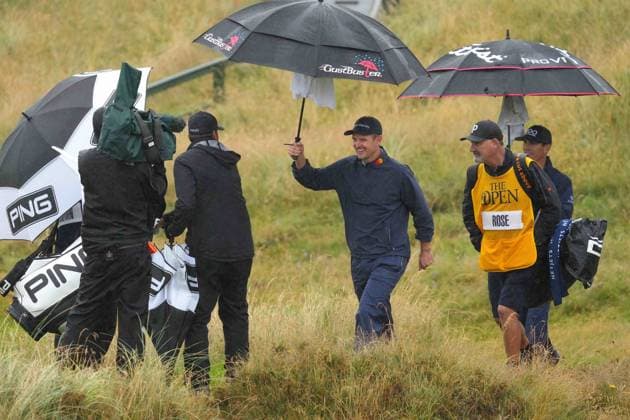 Justin Rose talks to Daniel Brown as he walks towards the 8th green. The British Open Championship, Day Three, Golf, Royal Troon, Troon, UK - 20 July 2024  Copyright: xStuartxWallace Shutterstockx 14588004ap