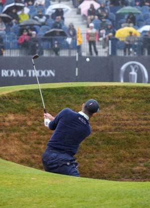 Justin Rose plays out of a bunker at the 17th green. The British Open Championship, Day Three, Golf, Royal Troon, Troon, UK - 20 July 2024  Copyright: xStuartxWallace Shutterstockx 14588004bt