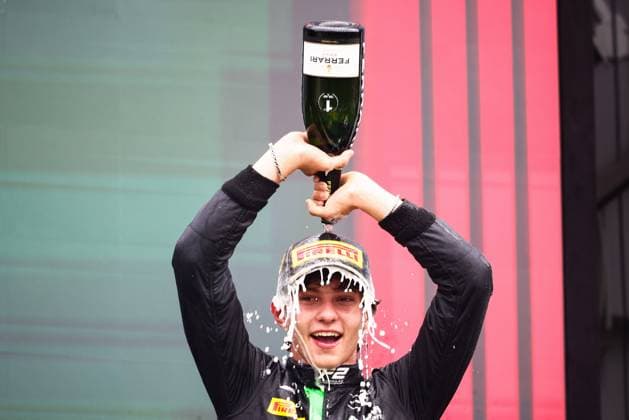 July 21, 2024, Budapest, Hungary: Race winner Andrea Kimi Antonelli of Italy and PREMA Racing celebrates on the podium during the Round 9 Budapest Feature race of the Formula 2 Championship at Hungaroring on July 21, 2024 in Budapest, Hungary. Budapest Hungary - ZUMAz156 0714248215st Copyright: xBeataxZawrzelx