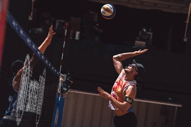 Beach volleyball men German Beach Tour 2024 Tourstop Munich 21 07 2024 Paul Henning at the attack Munich Central University Sports Beach Bavaria Germany