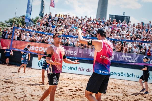 Beach volleyball men German Beach Tour 2024 Tourstop Munich 21 07 2024 f l Daniel Kirchner and Paul Henning celebrate after the victory Munich Central University Sports Beach Bavaria Germany