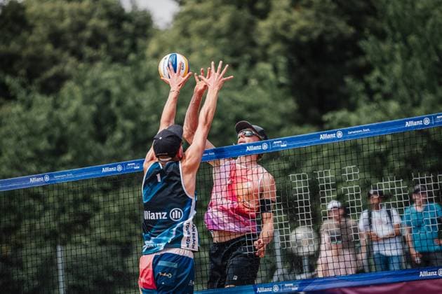 Beach volleyball men German Beach Tour 2024 Tourstop Munich 21 07 2024 Paul Henning on the right attacking Momme Lorenz on the left Munich Central University Sports Beach Bavaria Germany