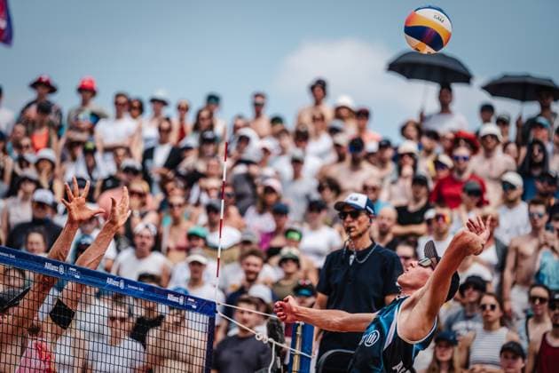 Beach volleyball men German Beach Tour 2024 Tourstop Munich 21 07 2024 Momme Lorenz on the right attacking Paul Henning on the left Munich Central University Sports Beach Bavaria Germany