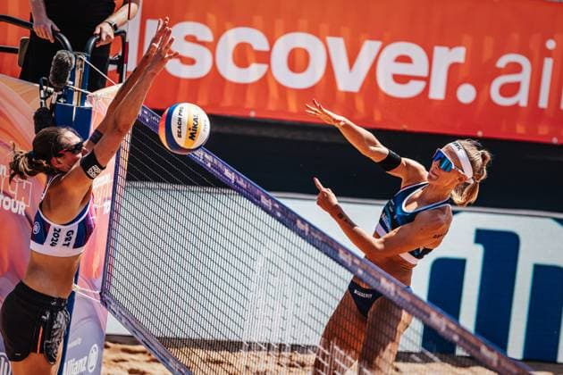 Beach volleyball men German Beach Tour 2024 Tourstop Munich 21 07 2024 Sandra Ittlinger on the right attacking Kira Walkenhorst on the left Munich Central University Sports Beach Bavaria Germany