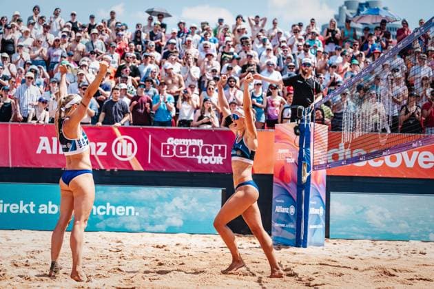 Beach volleyball men German Beach Tour 2024 Tourstop Munich 21 07 2024 f l Kim van de Velde and Sandra Ittlinger celebrate after winning Munich Central University Sports Beach Bavaria Germany