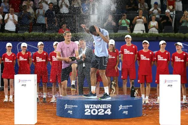 Tennis Men ATP, Tennis Men Tour 500 European Open Hamburg, Hamburg Open ATP 500 2024 , 21 07 2024 , Final , Alexander Zverev GER gives Arthur Fils FRA a champagne shower , Winner Hamburg 2024 Copyright: FernandoxSoares