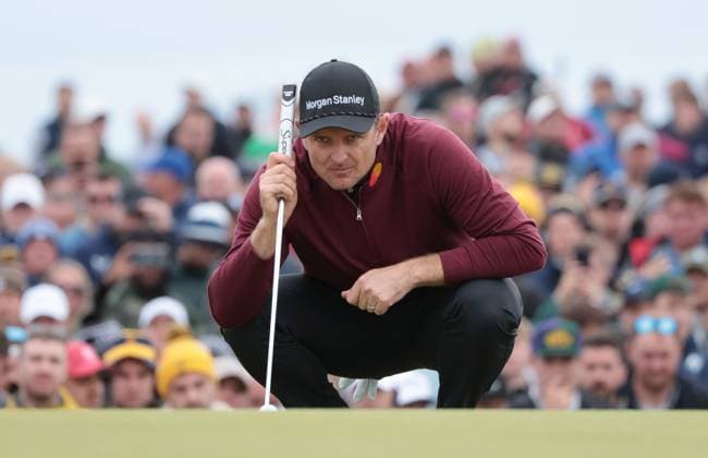 Justin Rose lines up a putt at the 152nd Open Championship at Royal Troon Golf Club in Troon, Scotland on Sunday, July 21, 2024. Schauffele won by two shots with a score of nine under under par.  LON2024072130 HUGOxPHILPOTT