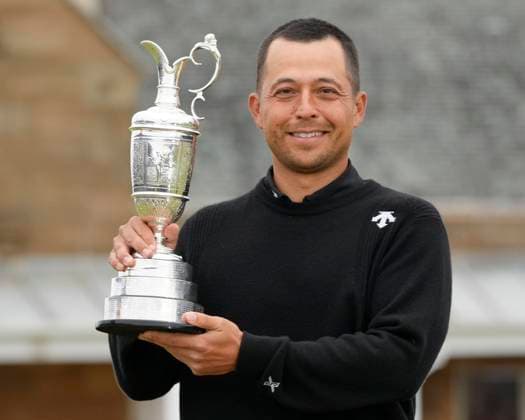 21st July 2024; Royal Troon Golf Club, Troon, South Ayrshire, Scotland; The Open Championship Final Round; Xander Schauffele lifts the claret jug after his victory with a score of 9 under par  ActionPlus12670920 StevenxFlynn