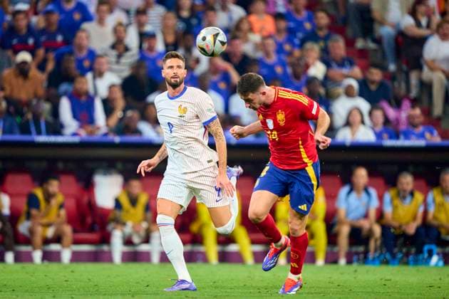 Olivier GIROUD, FRA 9 compete for the ball, tackling, duel, header, zweikampf, action, fight against Aymeric Laporte, ESP 14 in the semi final match SPAIN - FRANCE 2-1 of the UEFA European Championships 2024 on Jul 9, 2024 in Munich, Germany.
