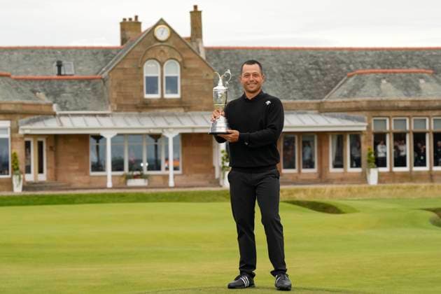 21st July 2024; Royal Troon Golf Club, Troon, South Ayrshire, Scotland; The Open Championship Final Round; Xander Schauffele shows off the Claret Jug in front of the Royal Troon Clubhouse  ActionPlus12671125 StevenxFlynn