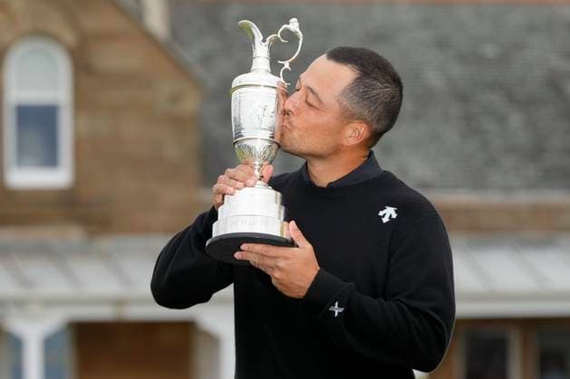 21st July 2024; Royal Troon Golf Club, Troon, South Ayrshire, Scotland; The Open Championship Final Round; Xander Schauffele kisses the Claret Jug in front of the Royal Troon Clubhouse  ActionPlus12671127 StevenxFlynn