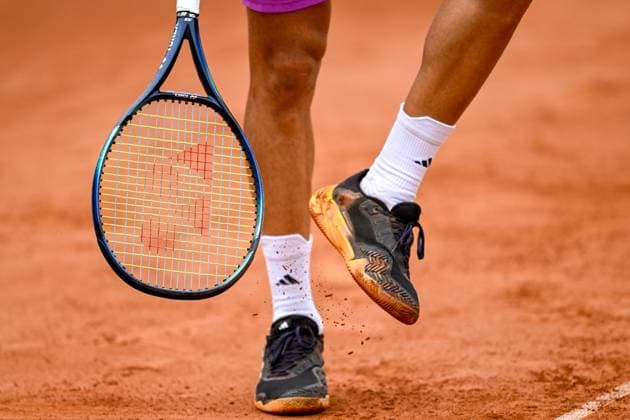 TENNIS - ATP, Tennis Herren Generali Open 2024 KITZBUEHEL,AUSTRIA,22.JUL.24 - TENNIS - ATP World Tour, Generali Open. Image shows a feature with a racket and two feet.  GEPAxpictures xDanielxSchoenherr