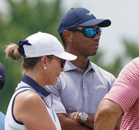 July 23, 2024, Bloomfield Hills, Michigan, USA: Tiger Woods (R) watches his son Charlie Woods (not pictured) with Amy Connelly, VP of Business Affairs of Tiger Woods Ventures, on the first hole - North Course during the second round of the 2024 U.S. Junior Amateur Championship at Oakland Hills Country Club. Bloomfield Hills USA - ZUMAw109 20240723_fap_w109_005 Copyright: xDebbyxWongx