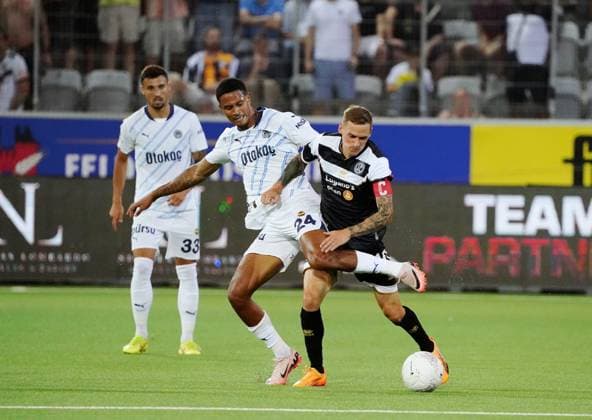 Anton Geisser 23 07 2024 Thun Switzerland Football Men 2024 2025 Qualification UEFA Champions League FC Lugano Fenerbahce SK Istanbul Picture Jayden Oosterwolde Fenerbahce SK vs Mattia Bottani FC Lugano r tackle action
