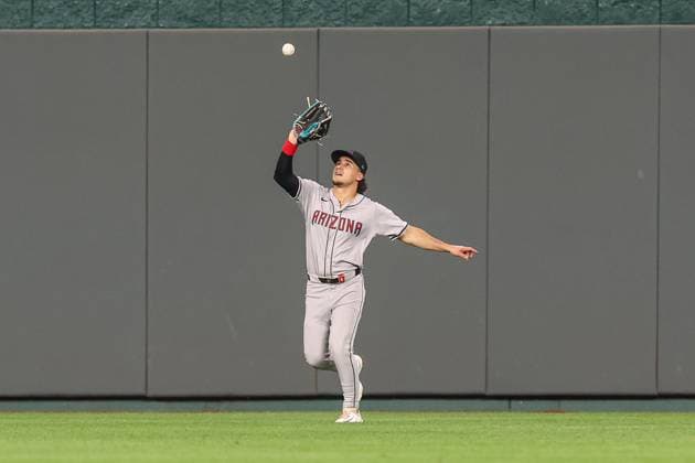 July 23, 2024: Arizona Diamondbacks outfielder Jake McCarthy (31) catches a fly ball for an out on Kansas City Royals outfielder Garrett Hampson (2) during the eighth inning at Kauffman Stadium in Kansas City, MO. CSM Kansas City United States of America - ZUMAc04_ 20240723_zma_c04_205 Copyright: xDavidxSmithx