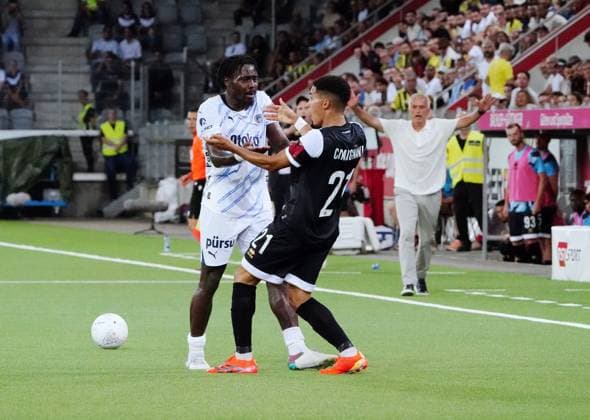 Anton Geisser 23 07 2024 Thun Switzerland Football Men 2024 2025 Qualification UEFA Champions League FC Lugano Fenerbahce SK Istanbul Picture Bright Osayi Samuel Fenerbahce SK vs Yanis Cimignani FC Lugano r tackle action