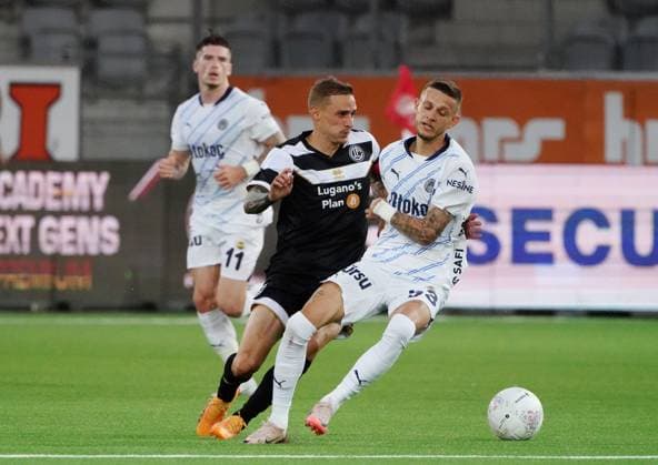 Anton Geisser 23 07 2024 Thun Switzerland Football Men 2024 2025 Qualification UEFA Champions League FC Lugano Fenerbahce SK Istanbul Picture Sebastian Szymanski Fenerbahce SK vs Mattia Bottani FC Lugano I Duel Action